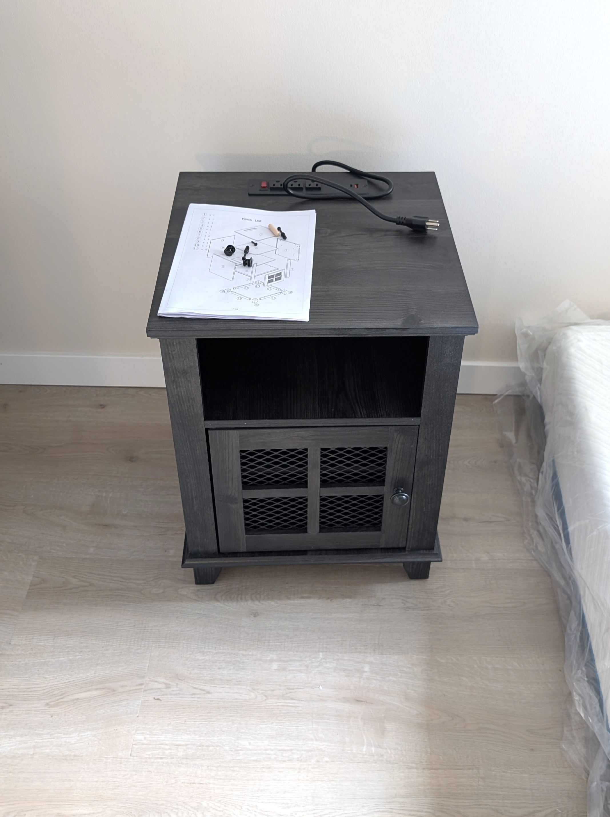 Nightstand assembly with built-in charging station