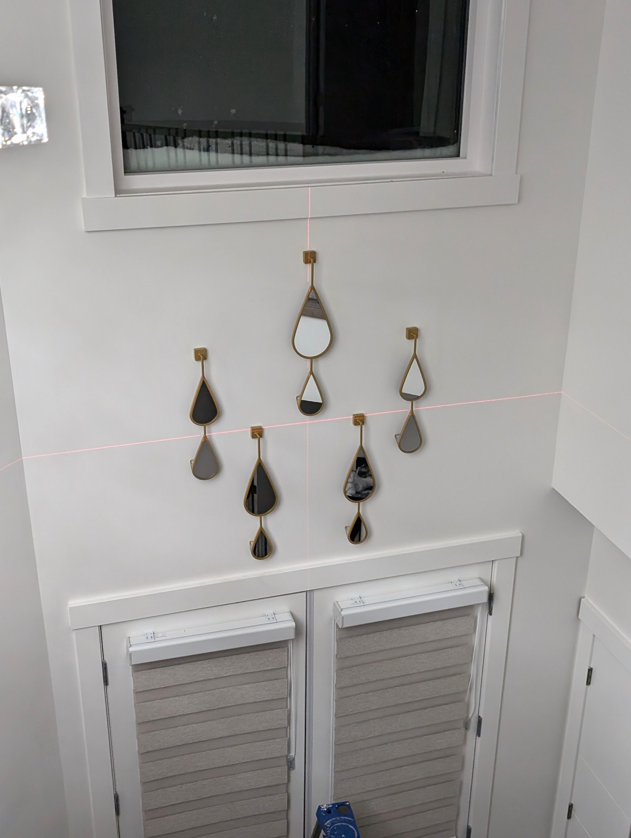 Set of decorative mirrors mounted in Calgary NE.