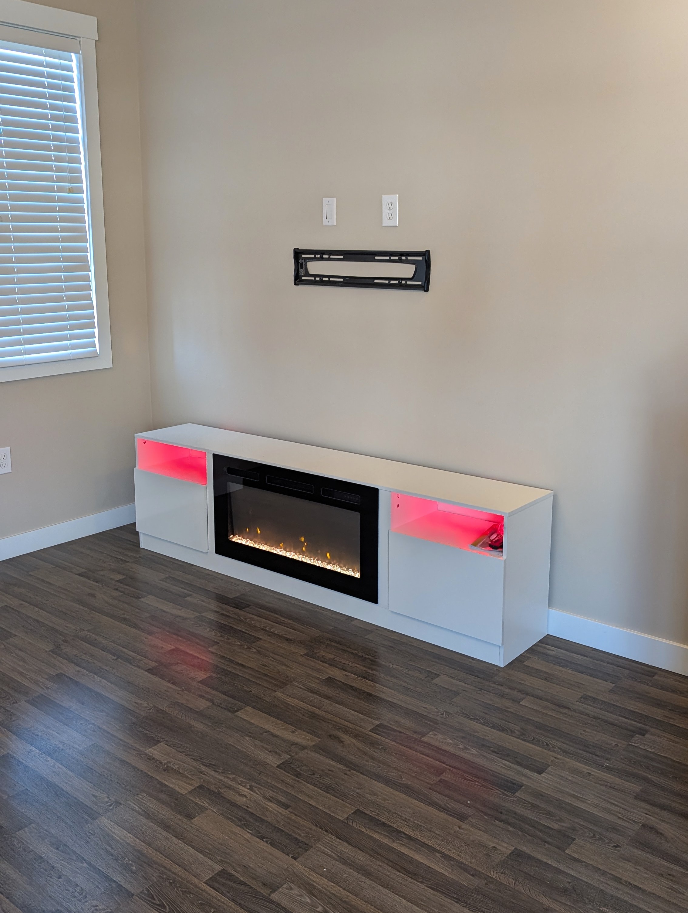 TV stand with electric fireplace assembled.