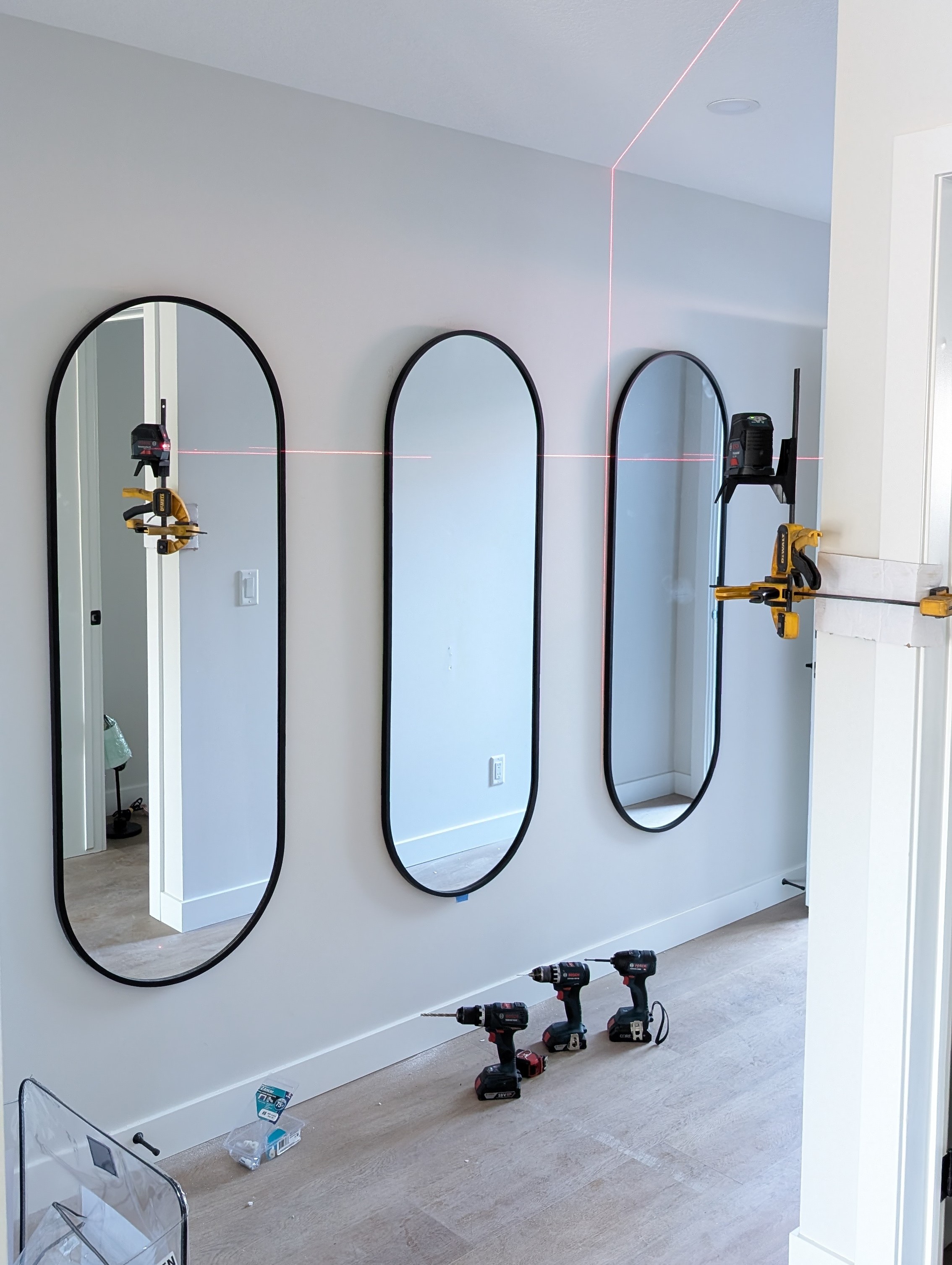 Wall-mounted mirrors installation