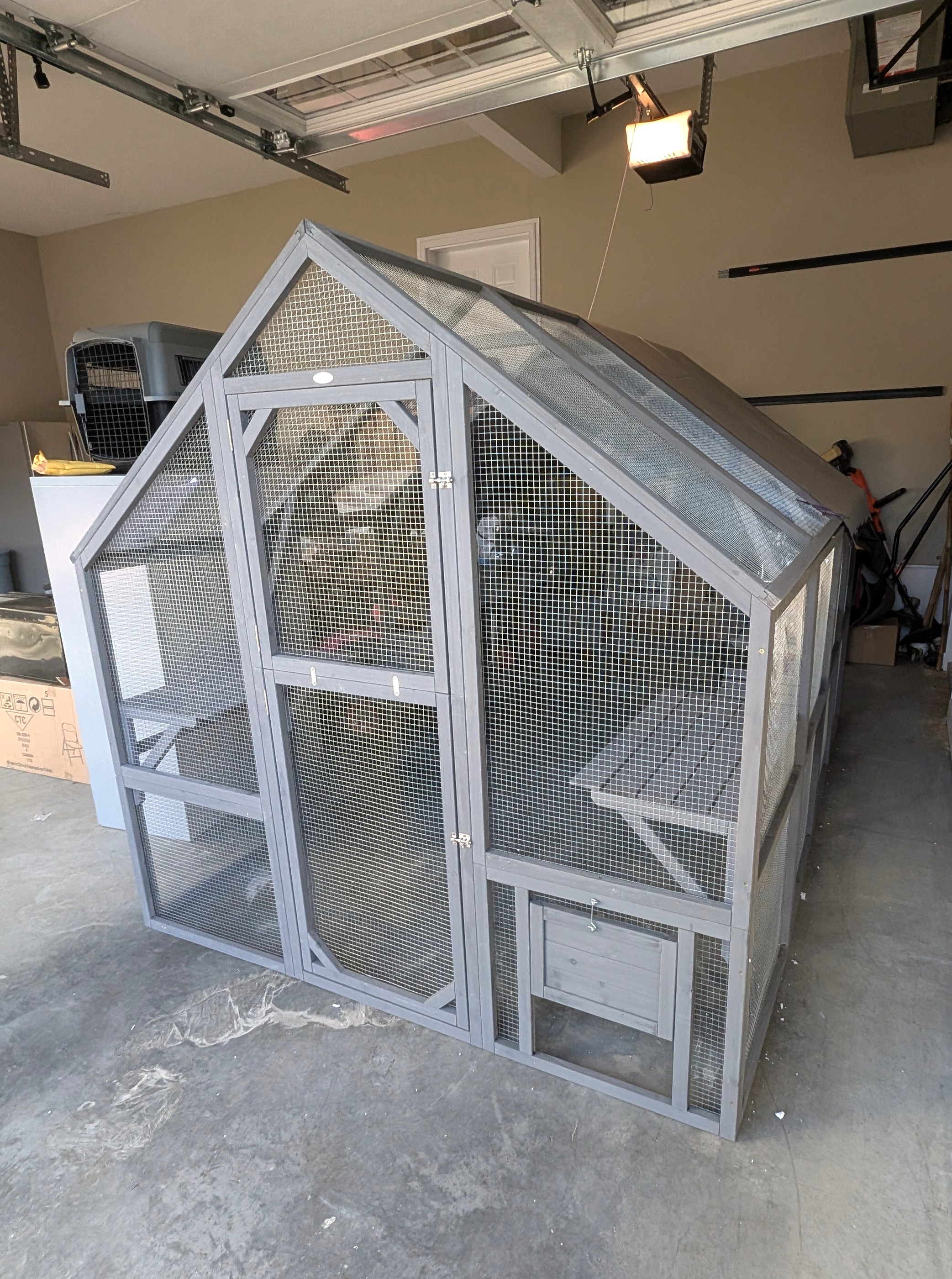 PawHut cathouse assembled in a garage in Chestermere.